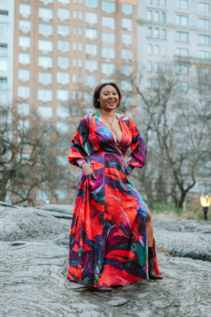 happy black girl, not an angry black girl, waterfall dress, big chest, double d, clevage, black blogger